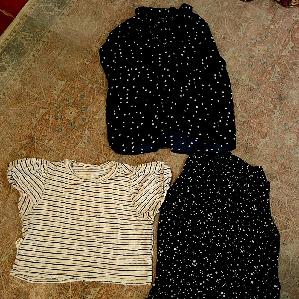 A trio of assorted small/medium shirts